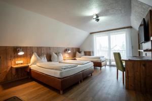 Postel nebo postele na pokoji v ubytování Hotel Restaurant Perschler
