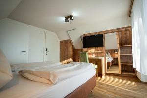 Postel nebo postele na pokoji v ubytování Hotel Restaurant Perschler