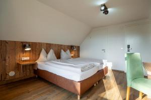Postel nebo postele na pokoji v ubytování Hotel Restaurant Perschler