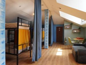 Postel nebo postele na pokoji v ubytování Hostel 13