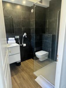 Ένα μπάνιο στο Appartements PORTICCIO CENTRE +16 φωτογραφίες