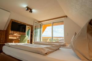 Postel nebo postele na pokoji v ubytování Hotel Restaurant Perschler