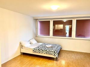 Downtown Flats, Lake Lucerne客房内的一张或多张床位