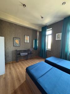 Postel nebo postele na pokoji v ubytování Hostel 13