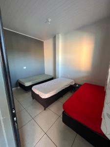 Katil atau katil-katil dalam bilik di Casa de temporada Stracini +11 gambar