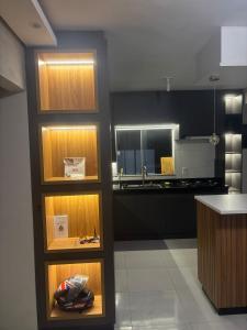 Dapur atau dapur kecil di Apartamento aconchegante em poços de caldas