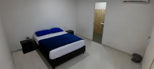 Postel nebo postele na pokoji v ubytování Hotel Roy