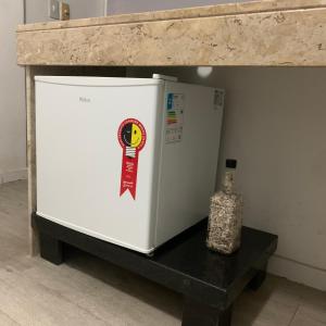 Η κουζίνα ή μικρή κουζίνα στο Sua casa +16 φωτογραφίες