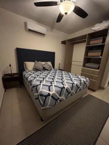 Ένα ή περισσότερα κρεβάτια σε δωμάτιο στο Club de Playa, Alberca y Amenidades - Departamento E4 +55 φωτογραφίες