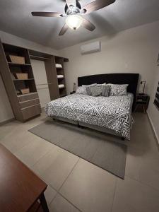 Ένα ή περισσότερα κρεβάτια σε δωμάτιο στο Club de Playa, Alberca y Amenidades - Departamento E4