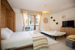 En eller flere senge i et værelse på Atlantic Selection - Studio Ivato, au Port de Capbreton