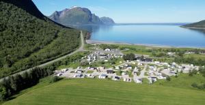 an aerial view of a large estate next to a lake at Storviksanden Camping in Storvik