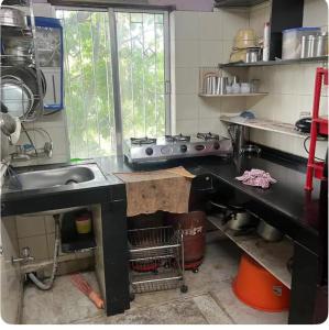 Una cocina o kitchenette en Chaudhary's Nest