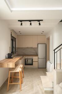 Køkken eller tekøkken på Ertha Retreat Homes