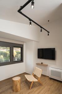 Et tv og/eller underholdning på Ertha Retreat Homes