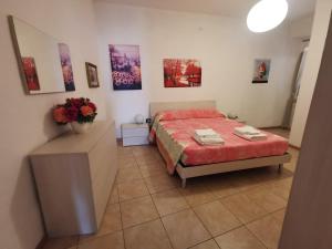 Ένα ή περισσότερα κρεβάτια σε δωμάτιο στο a Casa di Rosi 2