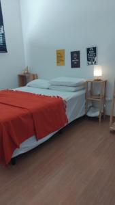 Ένα ή περισσότερα κρεβάτια σε δωμάτιο στο Apartamento Almagre a 600m da praia