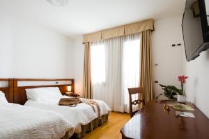 Postelja oz. postelje v sobi nastanitve Contra' Contarini