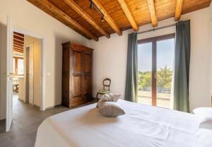 A bed or beds in a room at La Cantina Villa di campagna