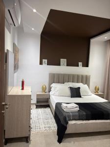 Ένα ή περισσότερα κρεβάτια σε δωμάτιο στο Le Majorelle +11 φωτογραφίες