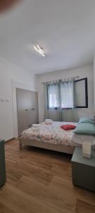 Кровать или кровати в номере Eraclea Minoa Apartments