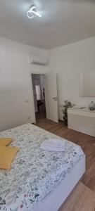 Кровать или кровати в номере Eraclea Minoa Apartments