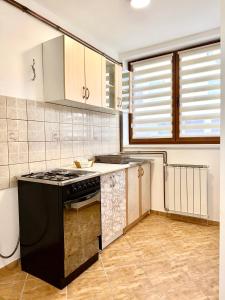 Una cocina o cocineta en Apartman Shams Sarajevo