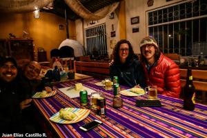 a group of people sitting at a table at Finca Castillo de Altura in San Juan