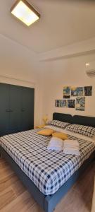 Кровать или кровати в номере Eraclea Minoa Apartments