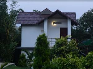 スルタン・バザリーにあるLe Eden Premium Wayanad Pool Resortのギャラリーの写真