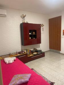 Posteľ alebo postele v izbe v ubytovaní Casa vacanza La Ninfea intera casa