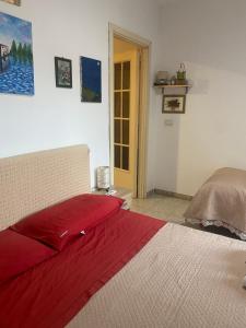 Posteľ alebo postele v izbe v ubytovaní Casa vacanza La Ninfea intera casa