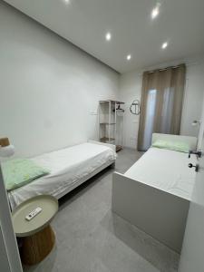 Postel nebo postele na pokoji v ubytování Villa Chiara