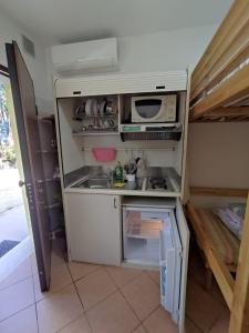 Η κουζίνα ή μικρή κουζίνα στο Il Laghetto 4