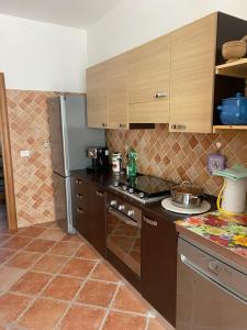 O bucătărie sau chicinetă la Casa Vacanze Mascioni