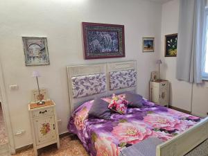Postel nebo postele na pokoji v ubytování Artisanti - DANIA HOME