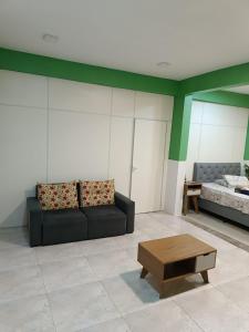 Ένα ή περισσότερα κρεβάτια σε δωμάτιο στο Loft no centro perto de tudo