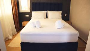 Postel nebo postele na pokoji v ubytování CASA DEL TITO