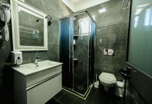 Kupatilo u objektu Hotel Floga +37 fotografija