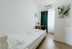 Krevet ili kreveti u jedinici u okviru objekta Hotel Floga