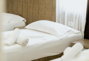Krevet ili kreveti u jedinici u okviru objekta Hotel Floga