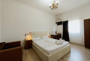Krevet ili kreveti u jedinici u okviru objekta Hotel Floga