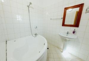 Kupatilo u objektu Hotel Floga