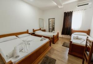 Krevet ili kreveti u jedinici u okviru objekta Hotel Floga