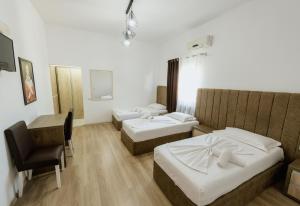 Krevet ili kreveti u jedinici u okviru objekta Hotel Floga