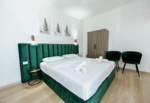 Krevet ili kreveti u jedinici u okviru objekta Hotel Floga