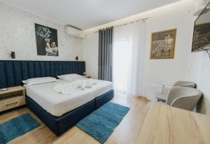 Krevet ili kreveti u jedinici u okviru objekta Hotel Floga