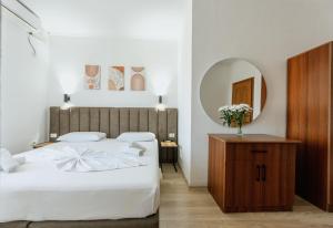 Krevet ili kreveti u jedinici u okviru objekta Hotel Floga