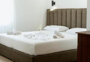 Krevet ili kreveti u jedinici u okviru objekta Hotel Floga