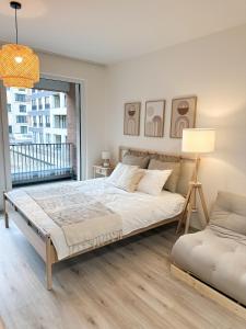Postel nebo postele na pokoji v ubytování Jack apartman , 02 Arena ,PVA Expo, Free parking + 29 fotografií